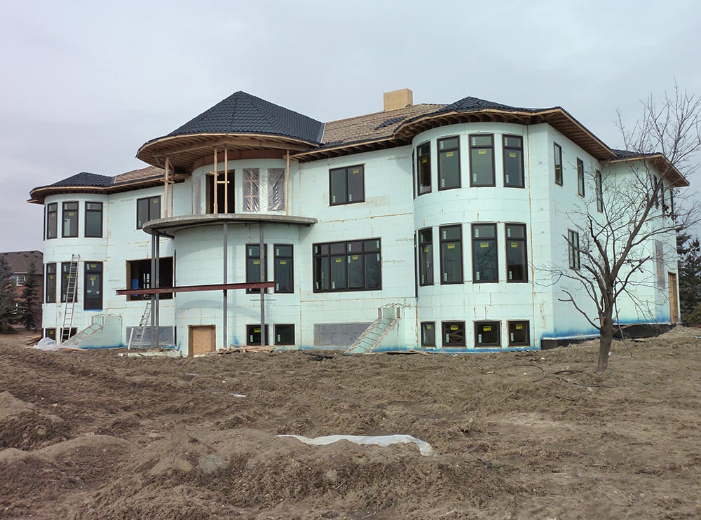 large home being built with icf